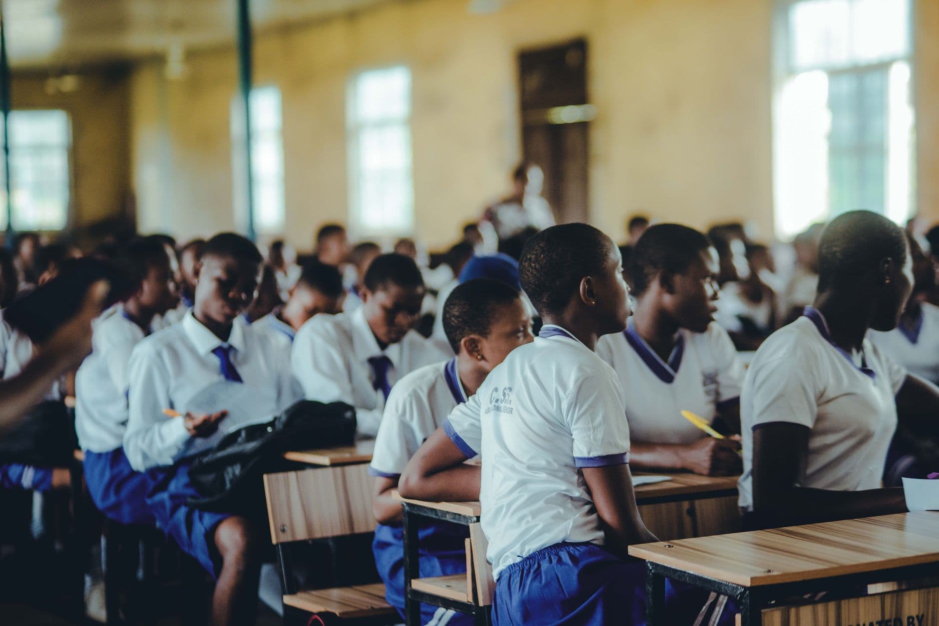 Students participating in a classroom lesson